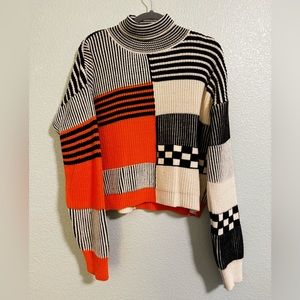 Mixed Pattern Roll Neck Knitted Sweater